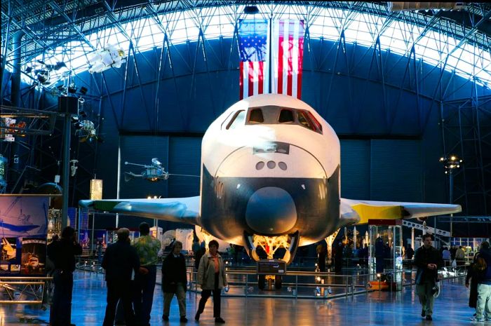 The Space Shuttle Enterprise is showcased inside the National Air and Space Museum.