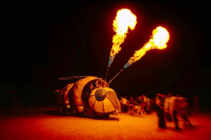 Flames erupting from a mutant vehicle at Burning Man