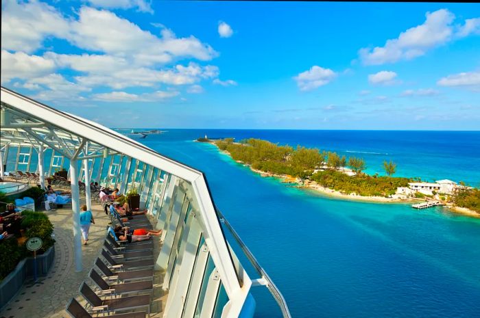 Passengers unwind as the Oasis of the Seas sets sail from the Bahamas.