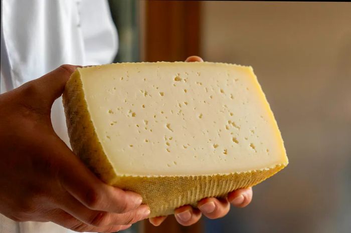 Manchego cheese, aged for different periods, offers a spectrum of flavors ranging from mild and creamy to sharp and nutty, making it a versatile favorite.