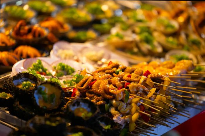 A selection of seafood skewers available at a market in Vietnam