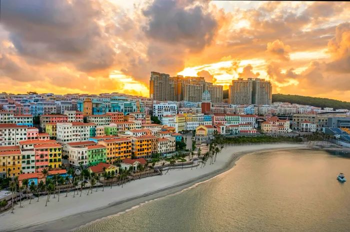 The sun sets over the charming pastel buildings of Sunset Town on Phu Quoc