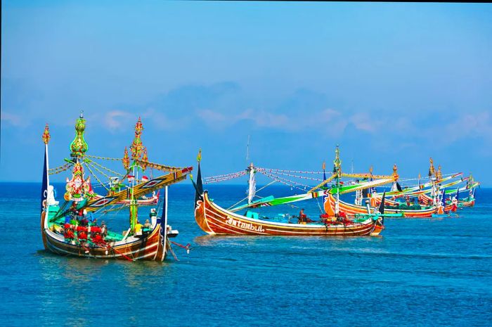 Traditional wooden fishing boats anchored near Perancak village, Bali, Indonesia