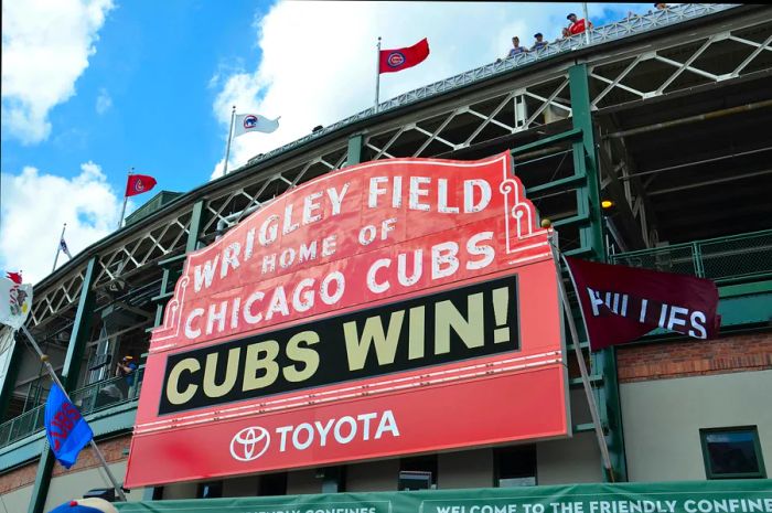 A sign displayed outside a stadium: Wrigley Field