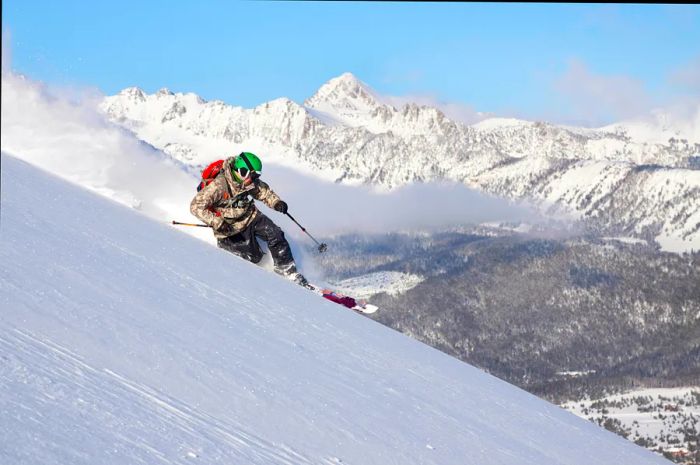 A male skier enjoying pristine powder at Big Sky, Montana