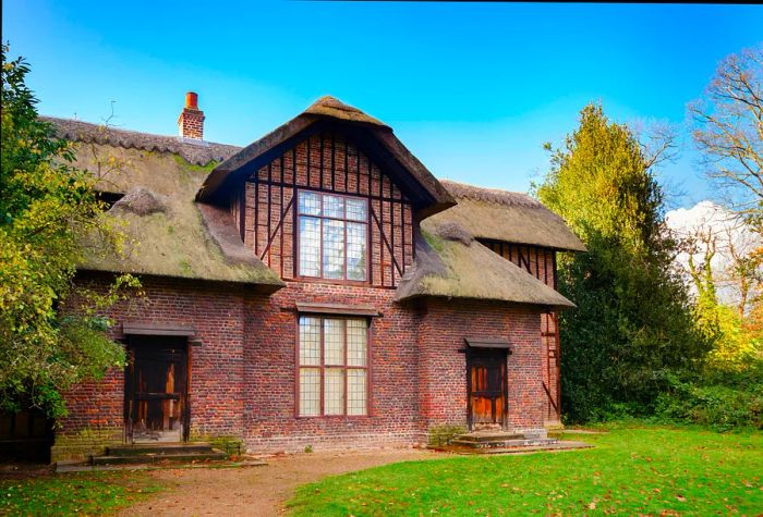 The thatched Queen Charlotte's Cottage at Kew Gardens botanical garden.