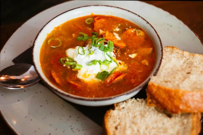 Kapustnica is a traditional Slovak soup made with sauerkraut and sausage.