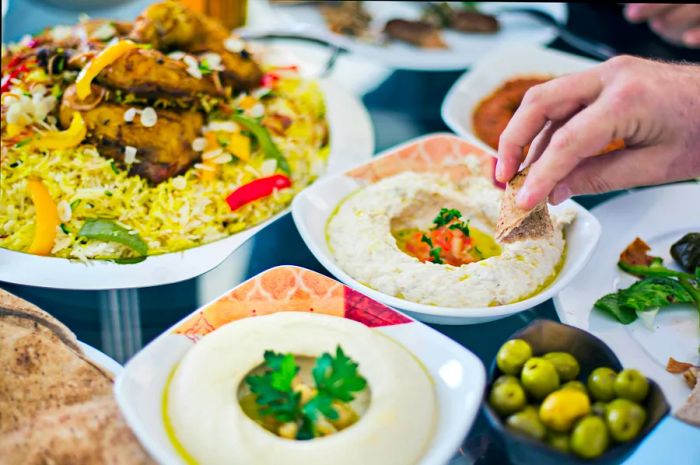 A dining table adorned with a variety of mezze in Dubai