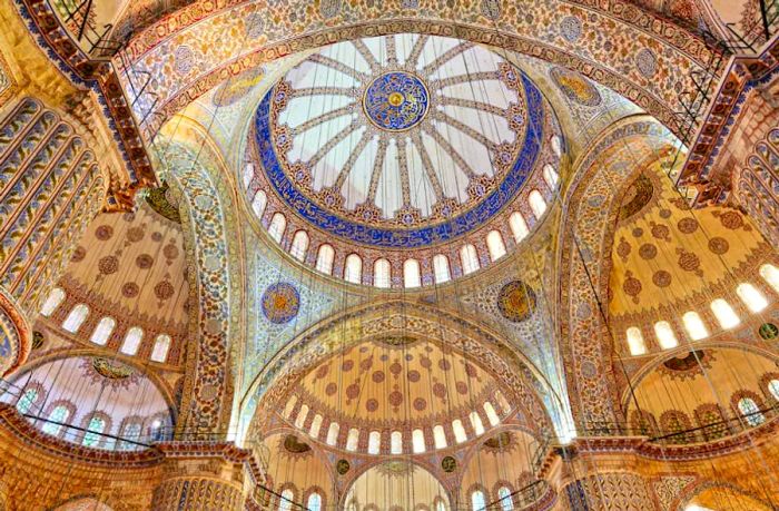 The vaulted ceiling of the Sultan Ahmed Mosque (Blue Mosque) is adorned with thousands of İznik tiles.