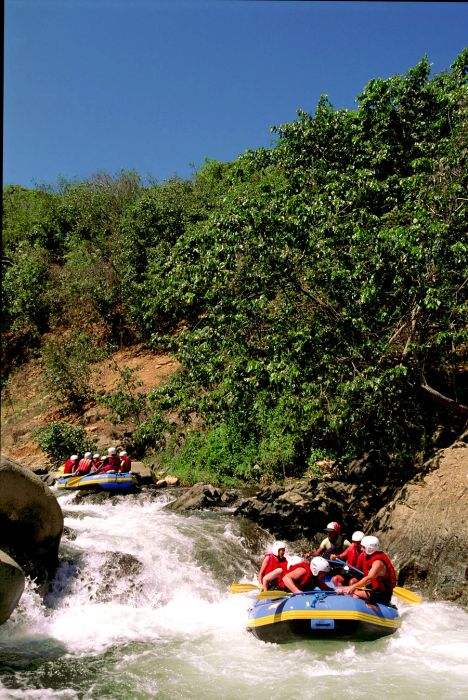 Experience the thrill of white-water rafting under the sun.