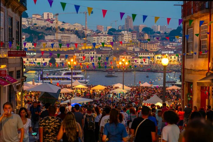 Festivities in the streets of the Ribeira neighborhood, Porto, Portugal