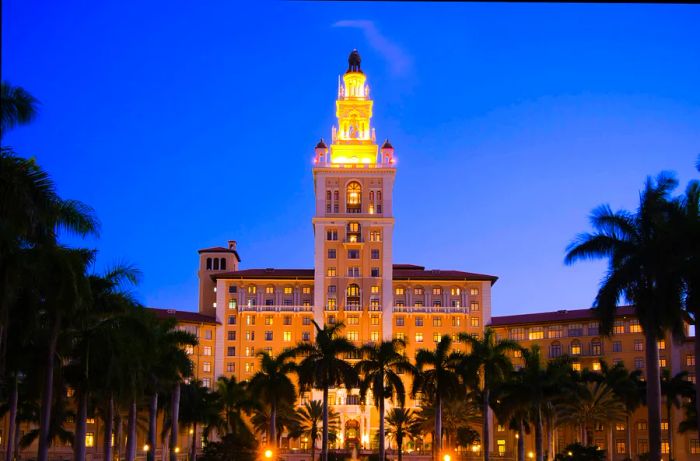 Nighttime view of the iconic Biltmore Hotel in Coral Gables, FL