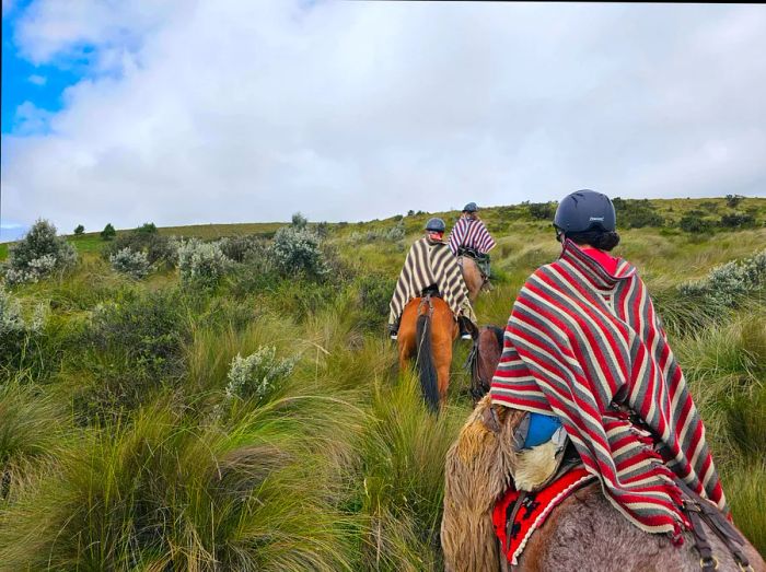 Chamidae and her mother horseback riding in Ecuador