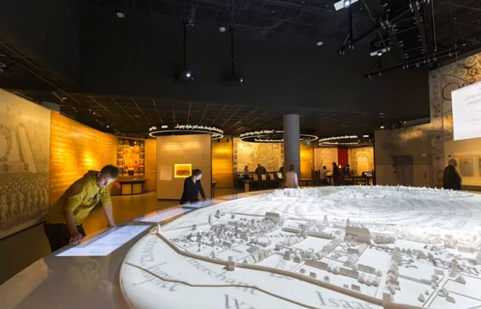 Visitors engage with the interactive displays at the Museum of the History of Polish Jews (POLIN).