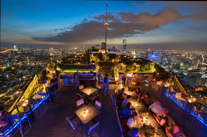 The skyline of Bangkok at dusk, viewed from the Moon Bar