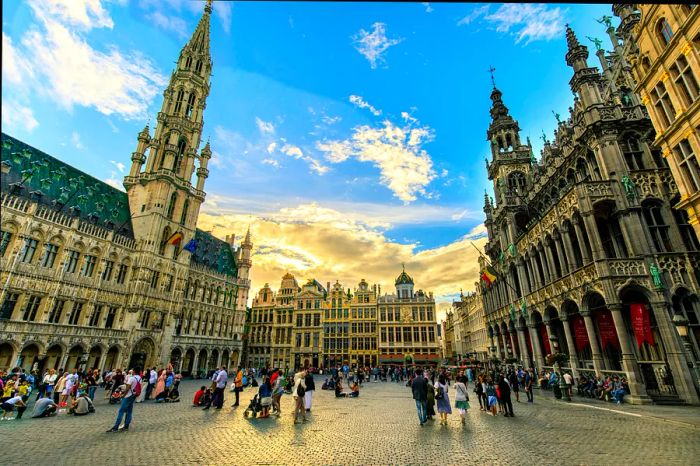 Tourists gather in the vibrant Grand Place square in Brussels, Belgium