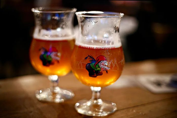 Two glasses of Belgian beer, La Chouffe, served in a bar in Brussels, Belgium