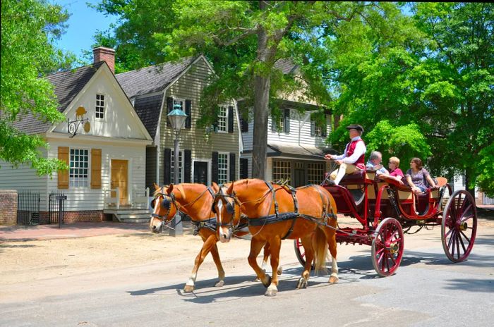 Horse-drawn carriage tours in the British Colony of Williamsburg, Virginia, USA.