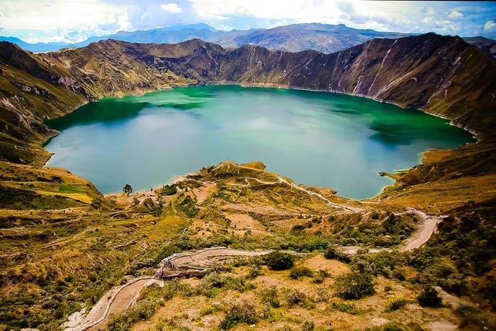 A caldera filled with water amid a volcanic landscape