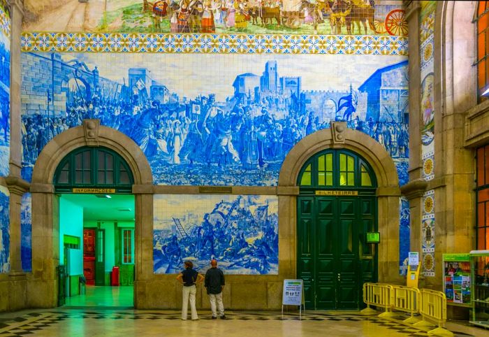 Azulejos mosaics adorn the interior of Porto's main train station.