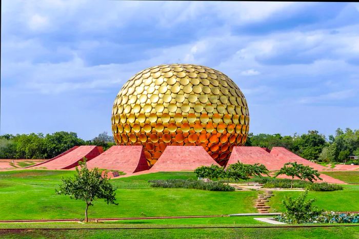 Matrimandir, a spiritually significant structure for yoga practitioners, is located in the heart of Auroville, Pondicherry, India