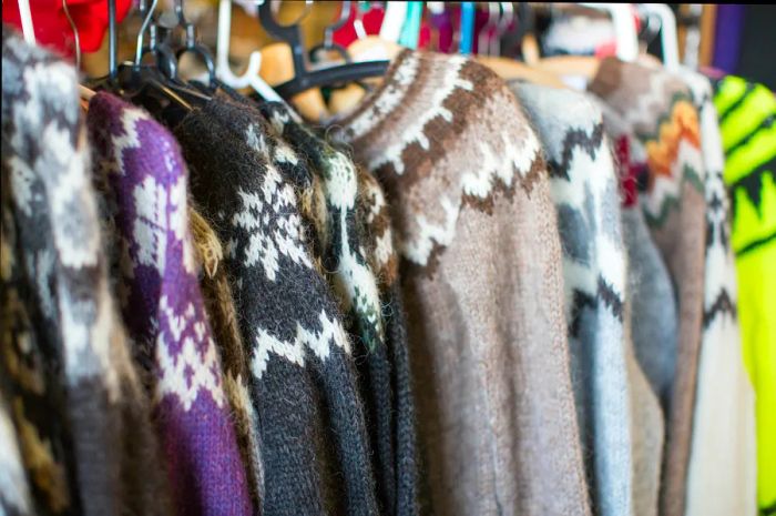 A selection of traditional Icelandic wool sweaters available at the Reykjavík Flea Market.