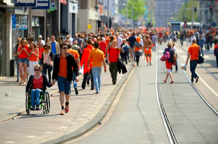 People strolling through the streets of Amsterdam