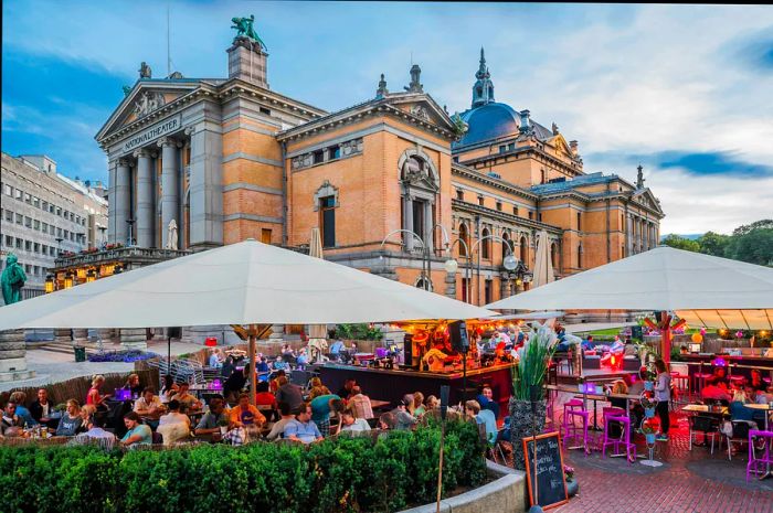 Bars and eateries around the National Theatre in Oslo.