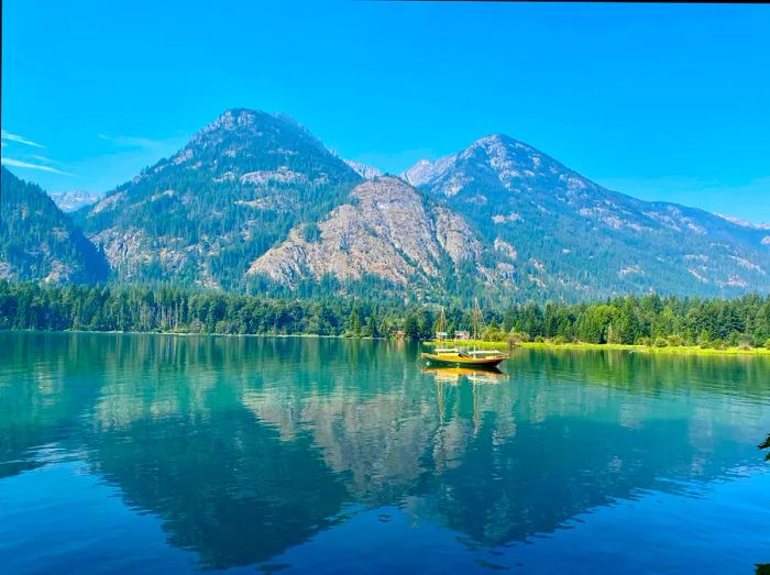 The tranquil reflection on Lake Chelan in North Cascades National Park