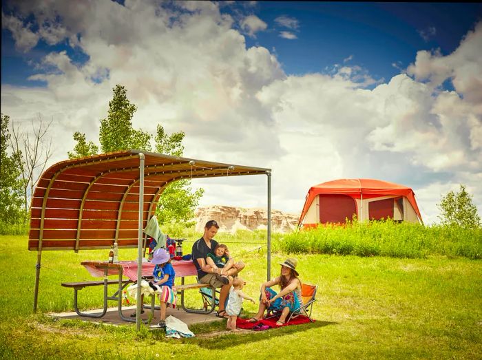 Family enjoying time at Cedar Pass campsite in Badlands National Park.