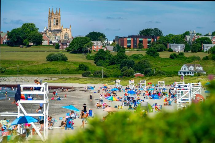 Morning at Sachuest Beach or Second Beach in Middletown, RI, with the picturesque St. George's School church in the background