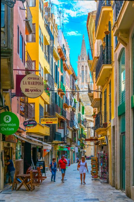 A glimpse of a charming narrow street in the historic heart of Palma de Mallorca, Spain