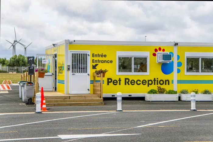 A bright yellow portacabin signposted