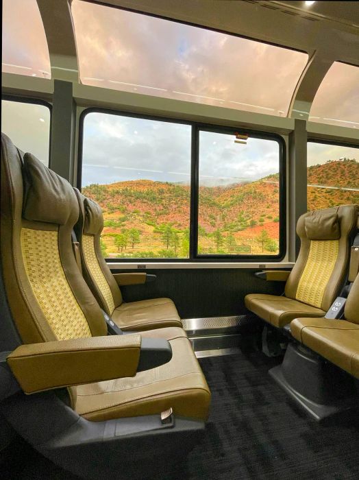 Train seats with expansive windows