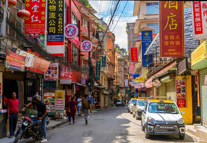 A line of taxis waiting on the street in the Thamel district of Kathmandu, Nepal.