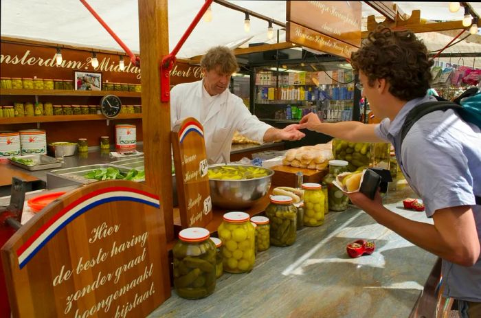 Visit the Albert Cuyp Market in the De Pijp neighborhood