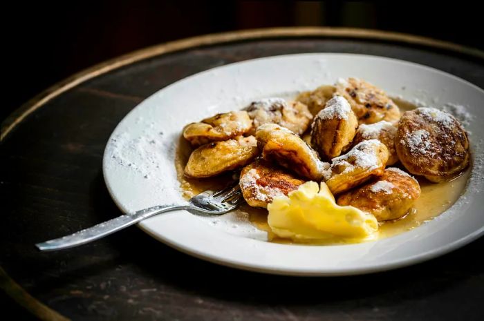 A delightful plate of poffertjes (fluffy mini pancakes) at Cafe De Prins.