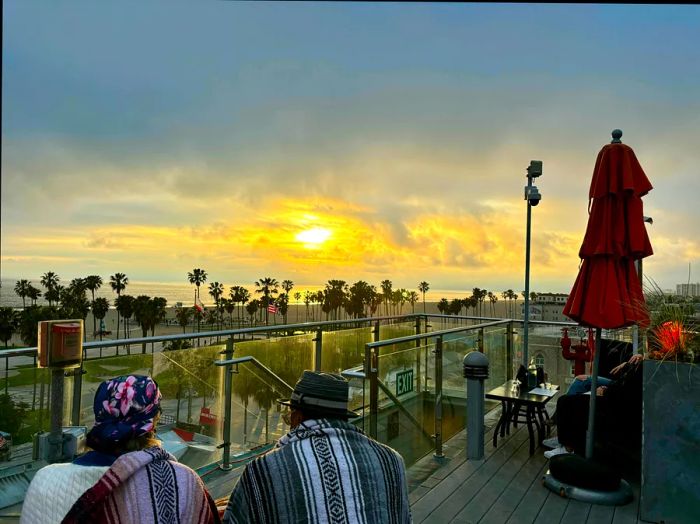 Enjoy a stunning sunset view from the rooftop of the Hotel Erwin, Venice Beach, LA