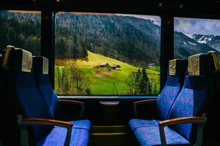 Enjoy stunning views of Switzerland from the Golden Pass Line train, traveling from Zweisimmen to Montreux.