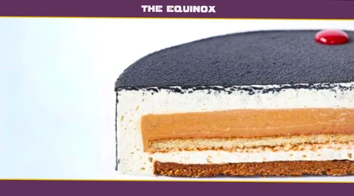 A close-up of an Equinox pastry sliced open to reveal its biscuit and caramel center