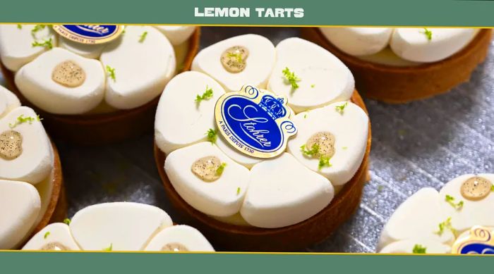 Close-up of lemon tarts adorned with icing shaped like flower petals