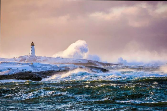 A lighthouse being battered by enormous waves