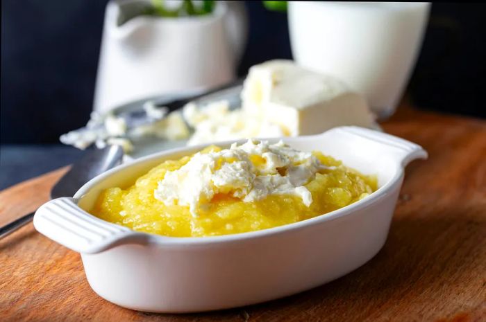 A close-up of <em>höşmerim</em>, a traditional cheese halva served with clotted cream.