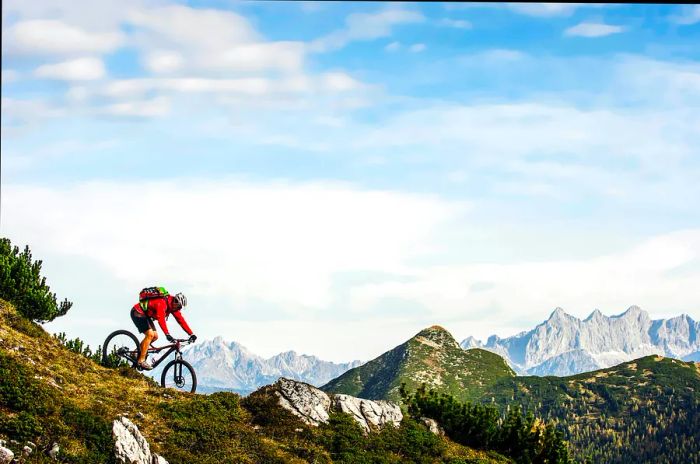 A young mountain biker enjoying the trails in Altenmarkt-Zauchensee, Austria