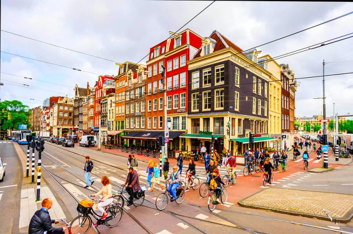 Bikes at a busy intersection in Amsterdam