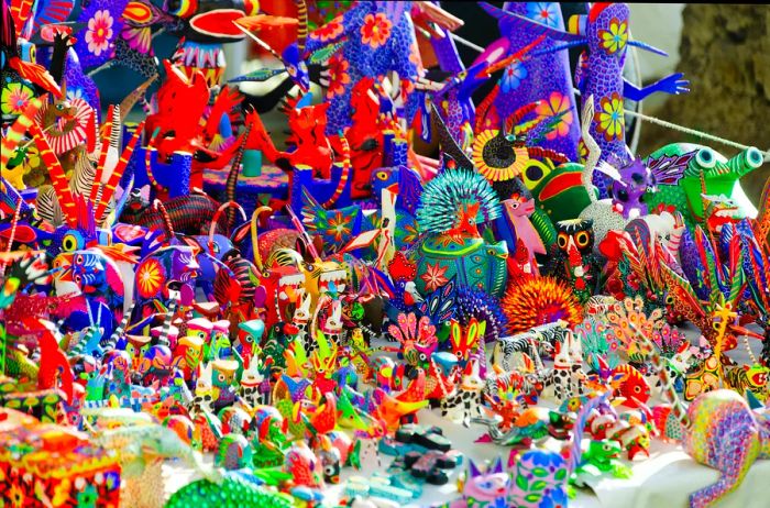 Colorful alebrijes on display in a market in Oaxaca.