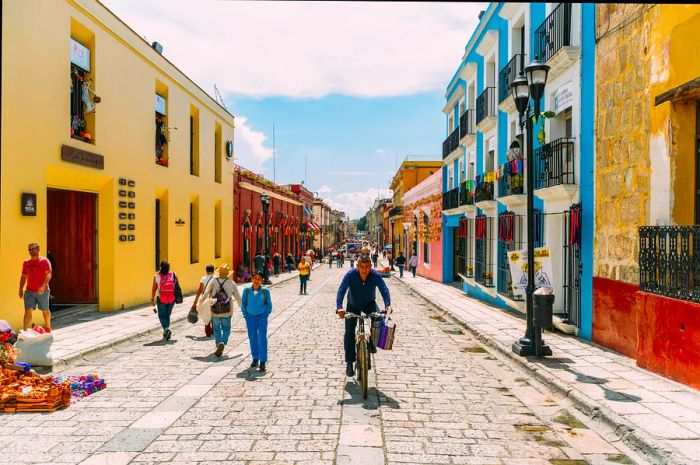 Vibrant Calle Macedonio Alcalá in the heart of Oaxaca.