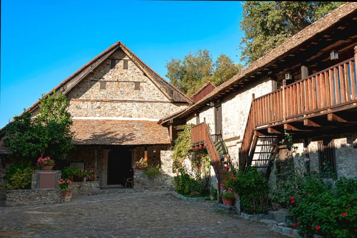 A charming stone structure topped with a wooden roof in Cyprus.