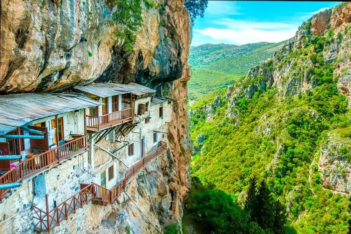 A cliffside monastery carved into the rock