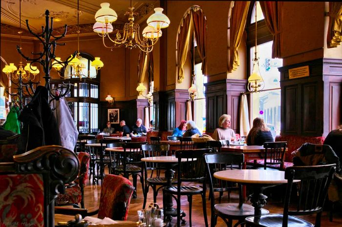 The cozy interior of Cafe Sperl in Vienna, Austria